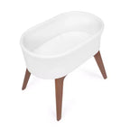 Culla portatile Aero con gambe in legno, bianca